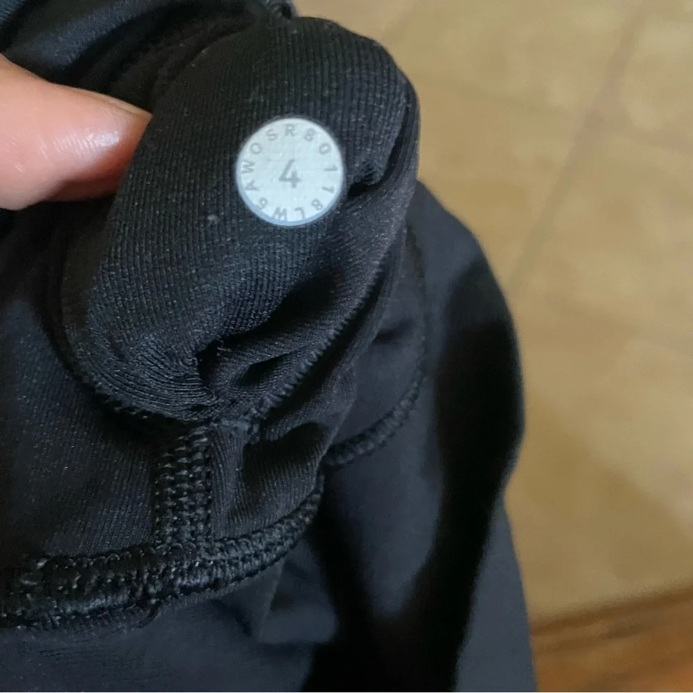 Lululemon black leggings size 4
